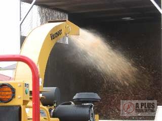 Brush Chipper Training Vemeer BC1200 Jet of Chips into
            Truck